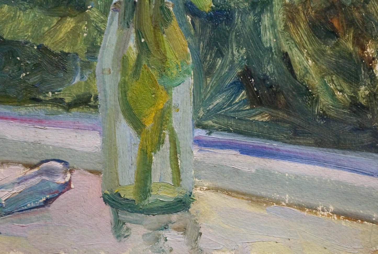 Oil painting of flowers in translucent green glass bottle