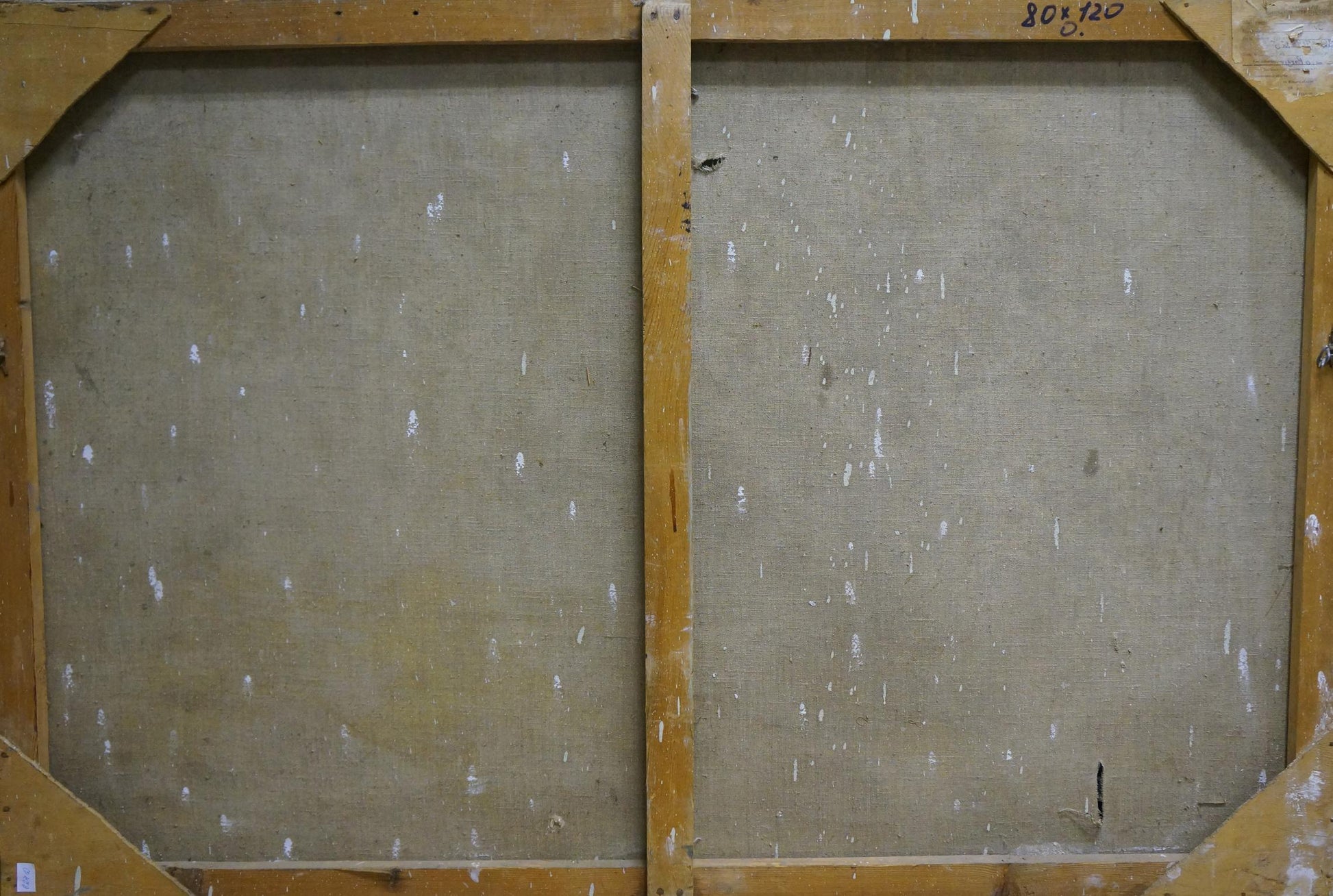 Back of Ivan Stoyanov oil painting Still life on canvas with beige fabric and staples