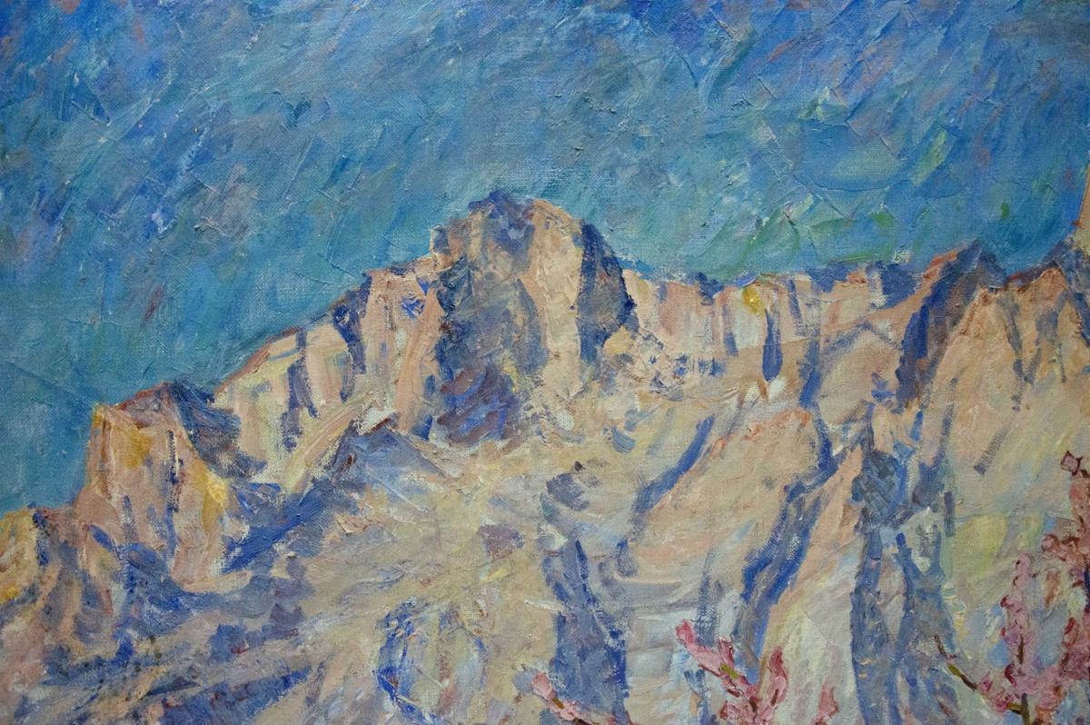 Impressionistic oil painting of blooming trees and rugged peaks by Koshevoi Stepan Lvovich