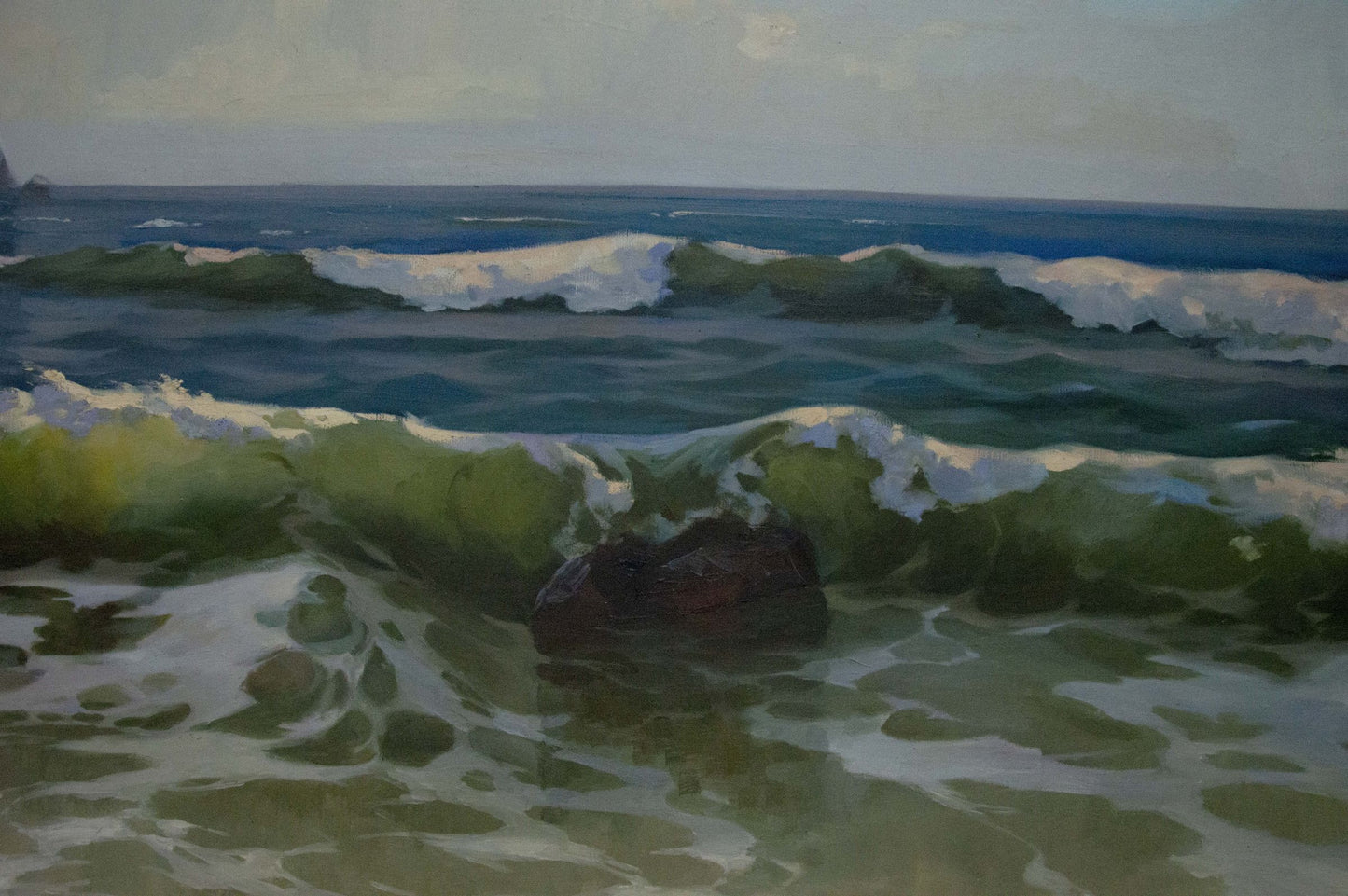 Oil painting by Tsyganok Nikitin: dark rock in greenish-blue waves with foam