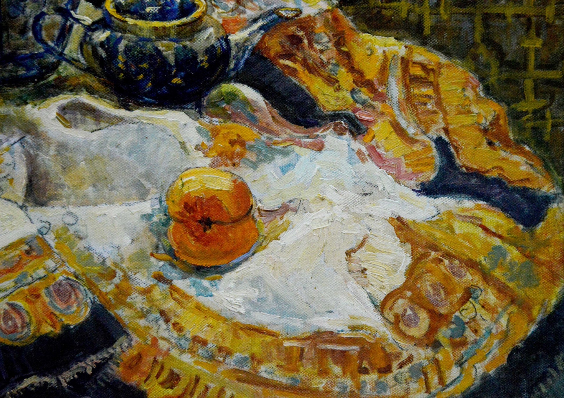 Oil painting of vibrant orange peach on ornate tablecloth by Alexander Stolyarenko