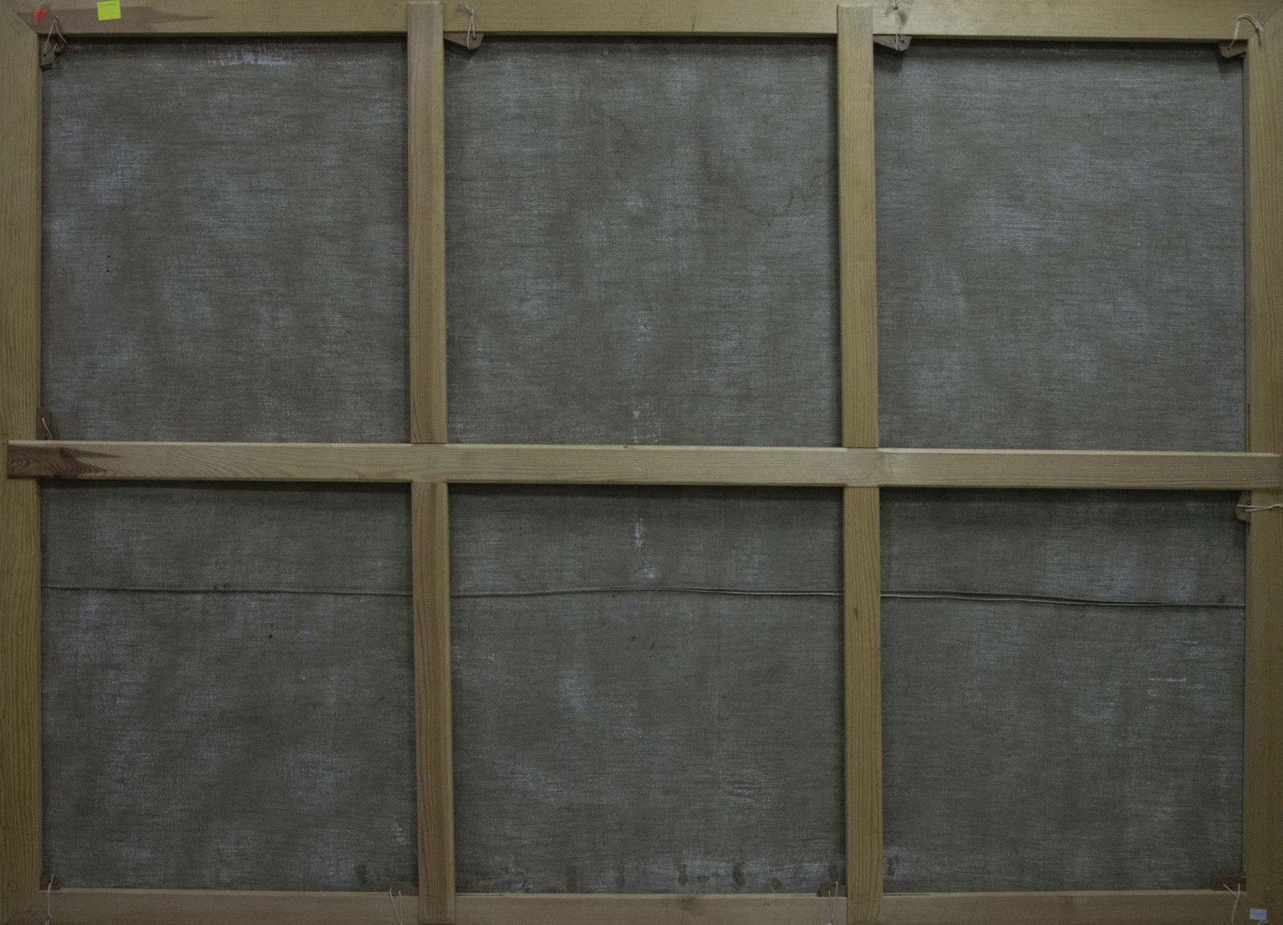 Back of wooden-framed oil painting Lilac near the window, six-panel gray fabric backing