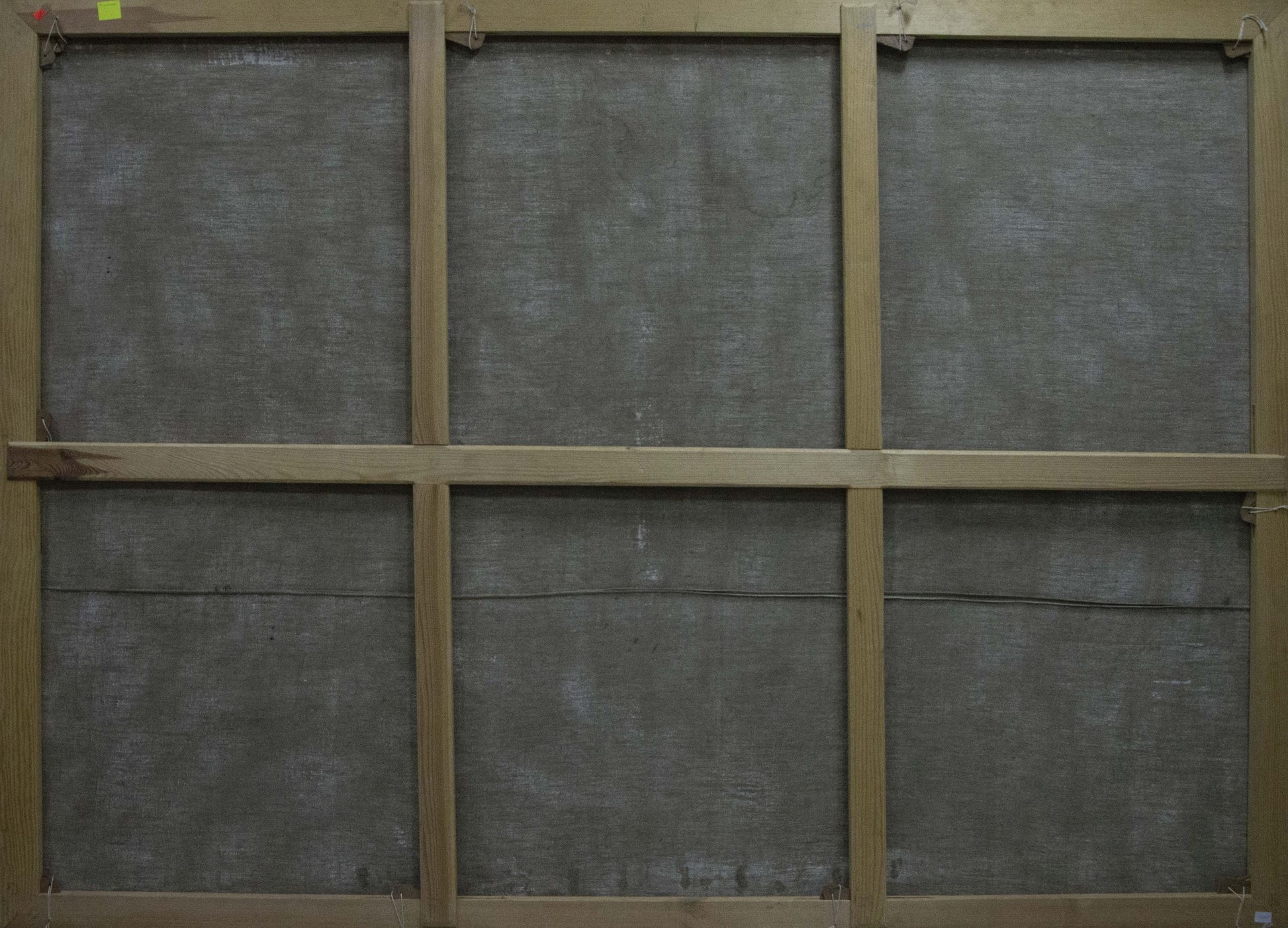 Back of wooden-framed oil painting Lilac near the window, six-panel gray fabric backing