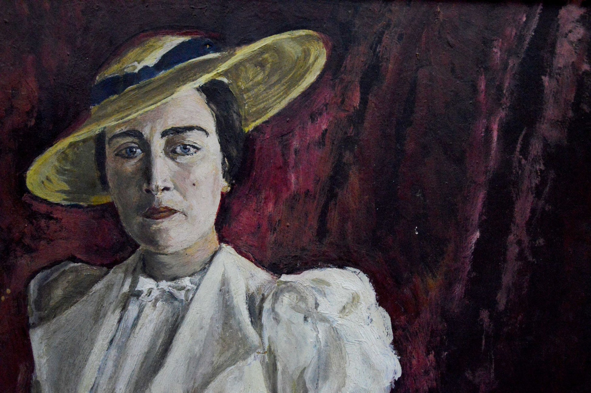 Oil painting of woman in yellow hat and blouse by Vladimir Shkatelov
