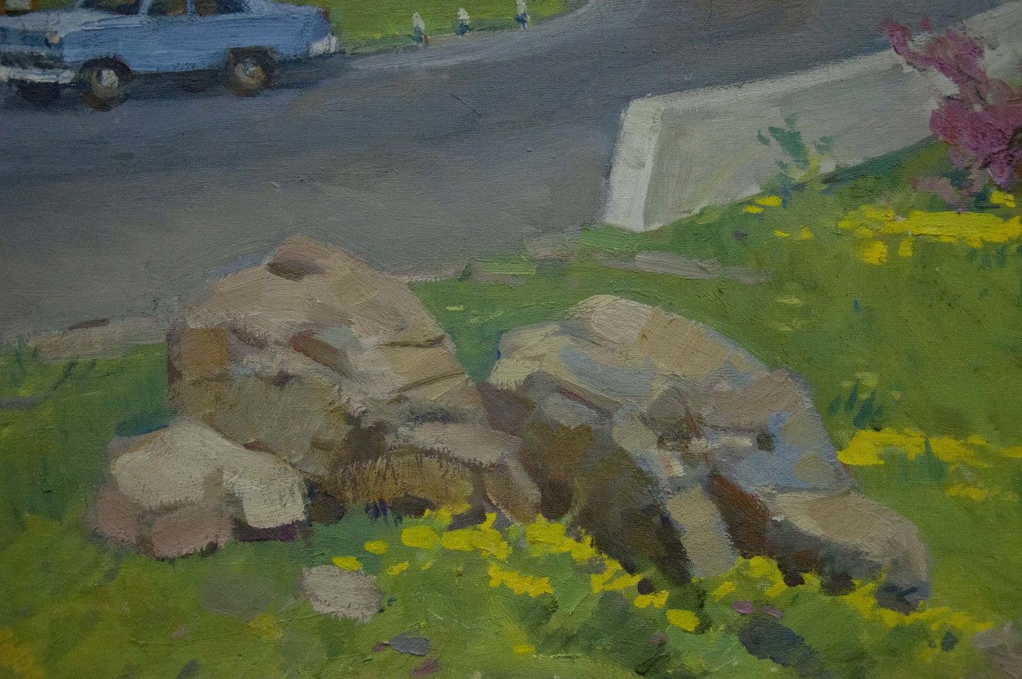 Oil painting of mountain road with rough rocks, yellow wildflowers in sunlit grass