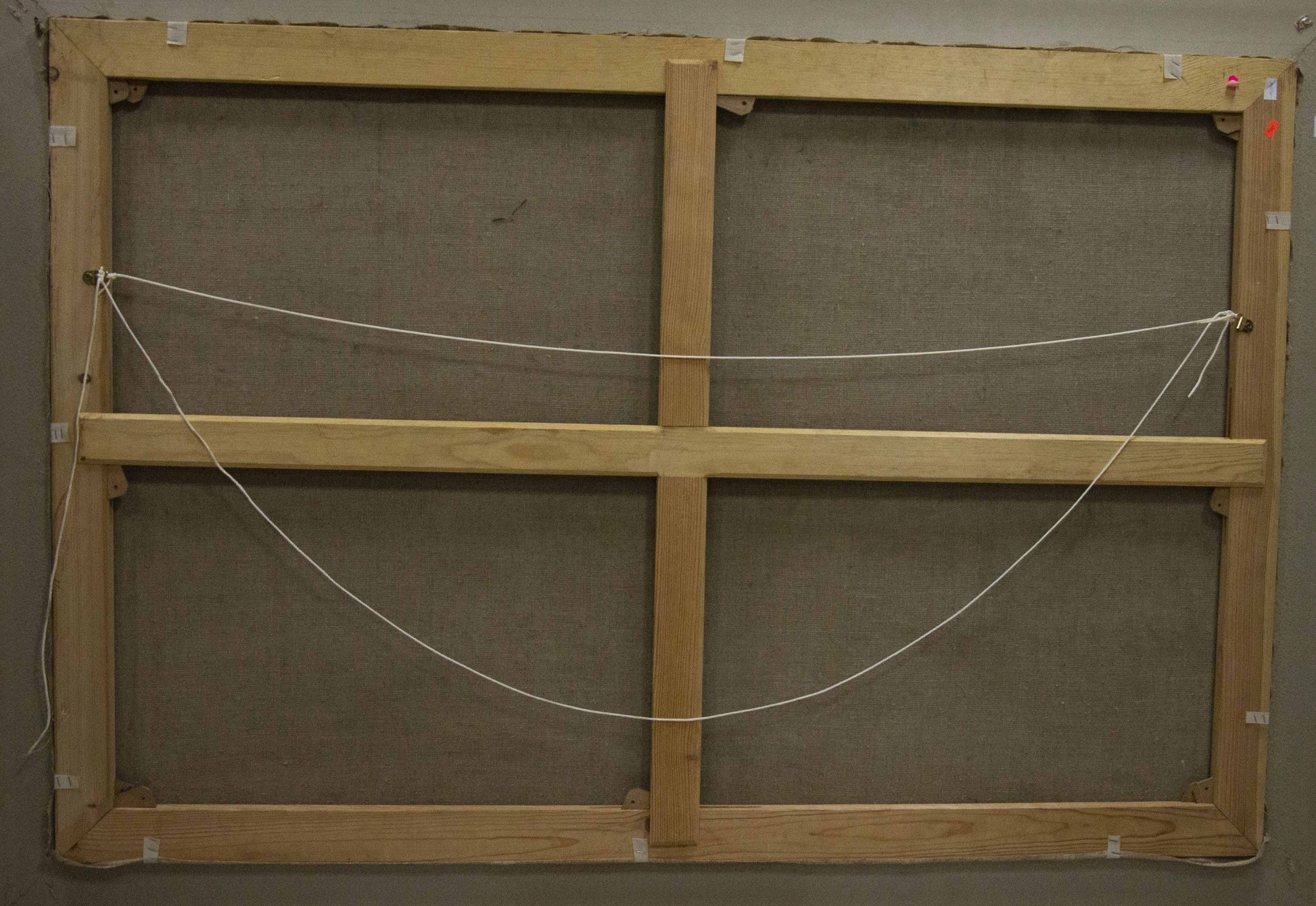 Back of light wooden canvas frame for Oil painting Landscape Chegodar Vasily Dmitrievich with cross-bracing and white string tensioning