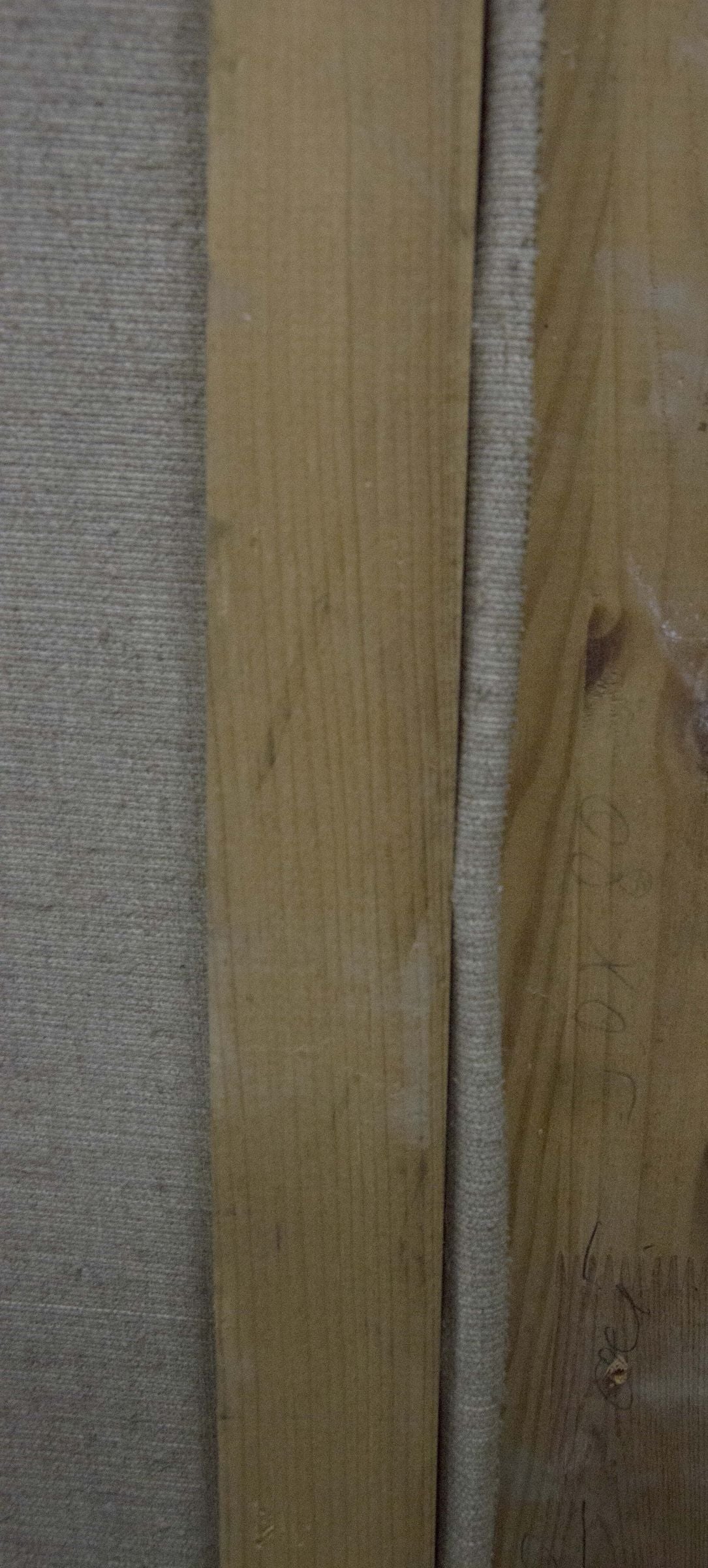 Back of oil painting by Kerzhner Efim Aleksandrovich: two light brown wooden planks