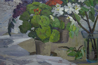 Oil painting of vibrant green potted geraniums with white and red blossoms by Zhugan Vladimir Alexandrovich