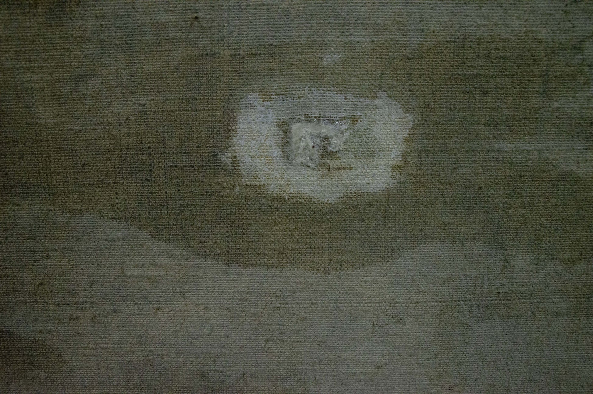 Back of Oil painting Lilac by Nadezhda Kompaniyets-Kiyanchenko with worn gray fabric and central white damage