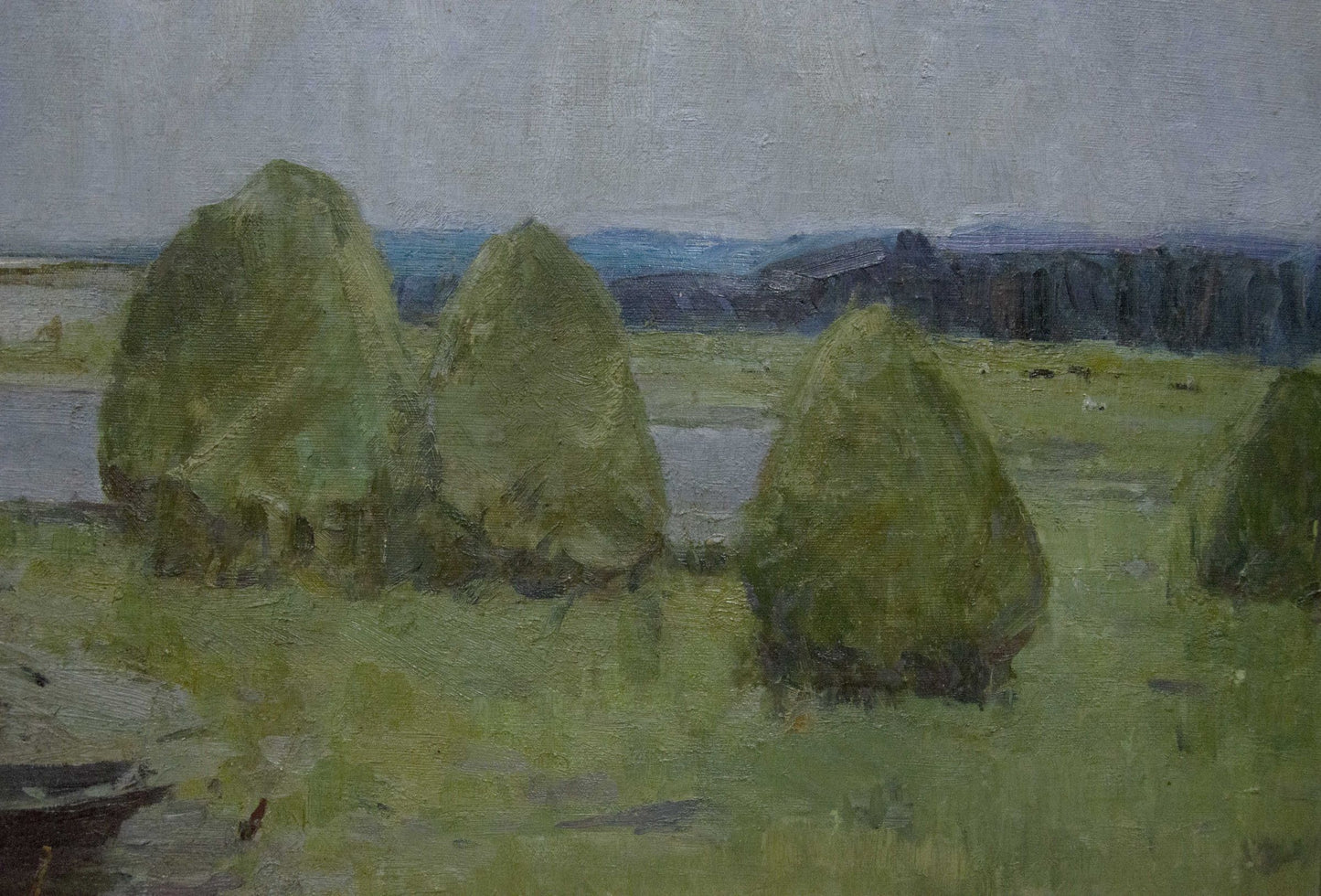 Oil painting Near the shore by Sevastyanov Victor Grigorievich: three conical hay bales in muted greens and browns