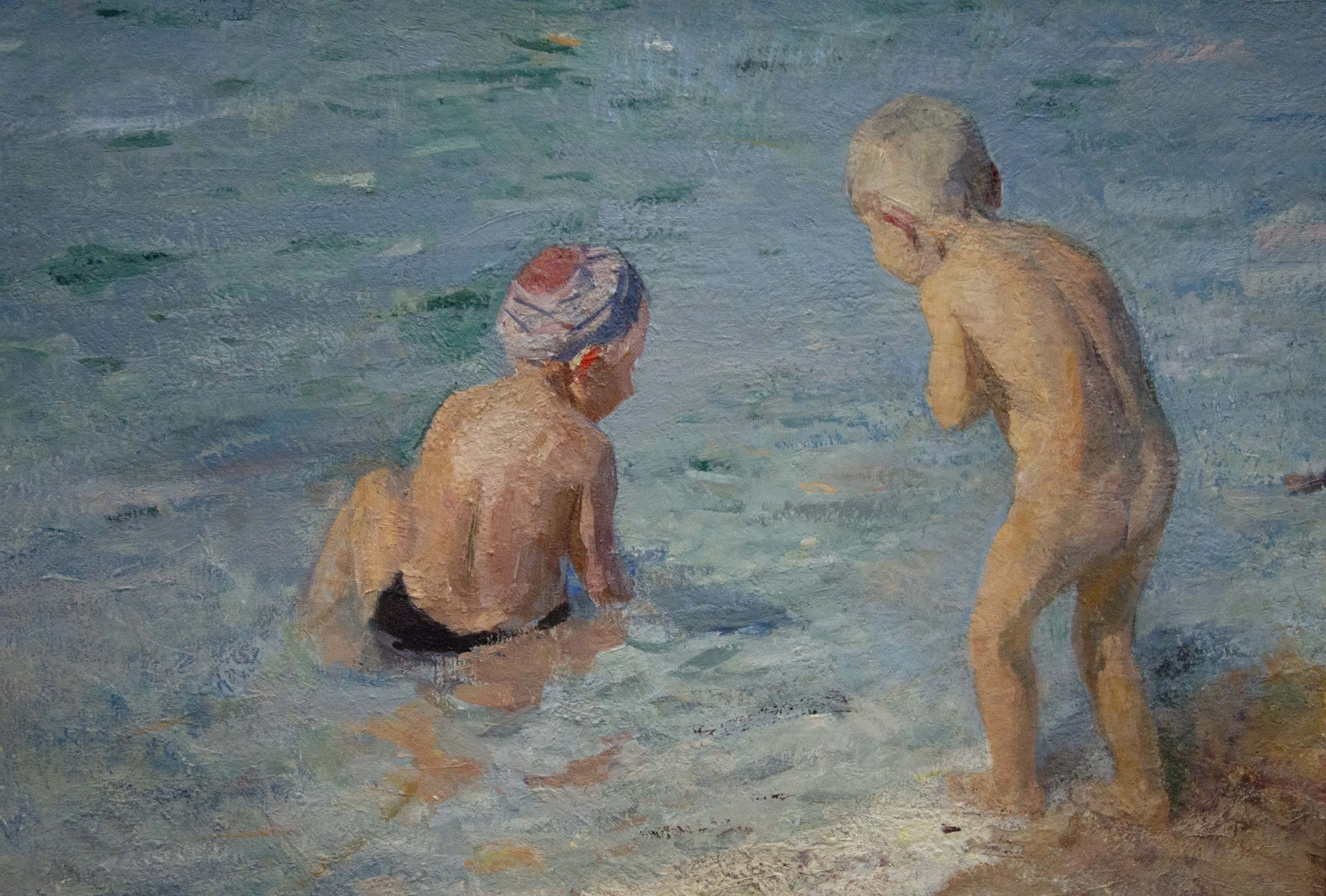 Oil painting by Naumova Tamara Sergeevna: two children in swim caps and trunks play in shallow beach water