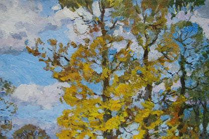 Oil painting of vibrant yellow tree in park by Khodchenko Lev Pavlovich