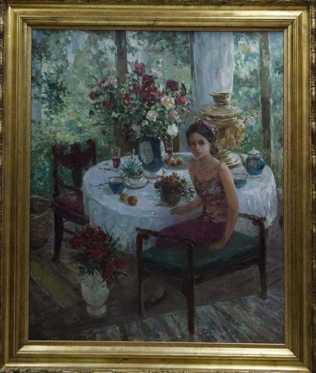 Oil painting by Mikhaylichenko Sergey Viktorovich: woman in floral dress at table with samovar