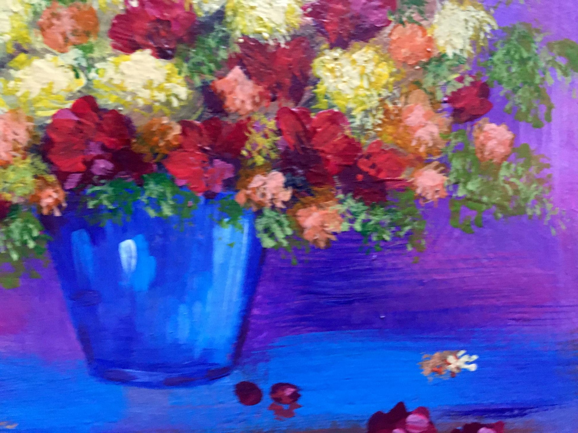 Oil painting of vibrant red, yellow, peach bouquet in blue vase by Zadorozhnya V. V