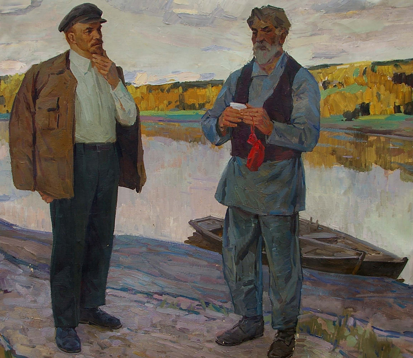 Man’s hands holding red fabric pouch of Lenin oil painting by Zoya Alexandrovna Samoylenko