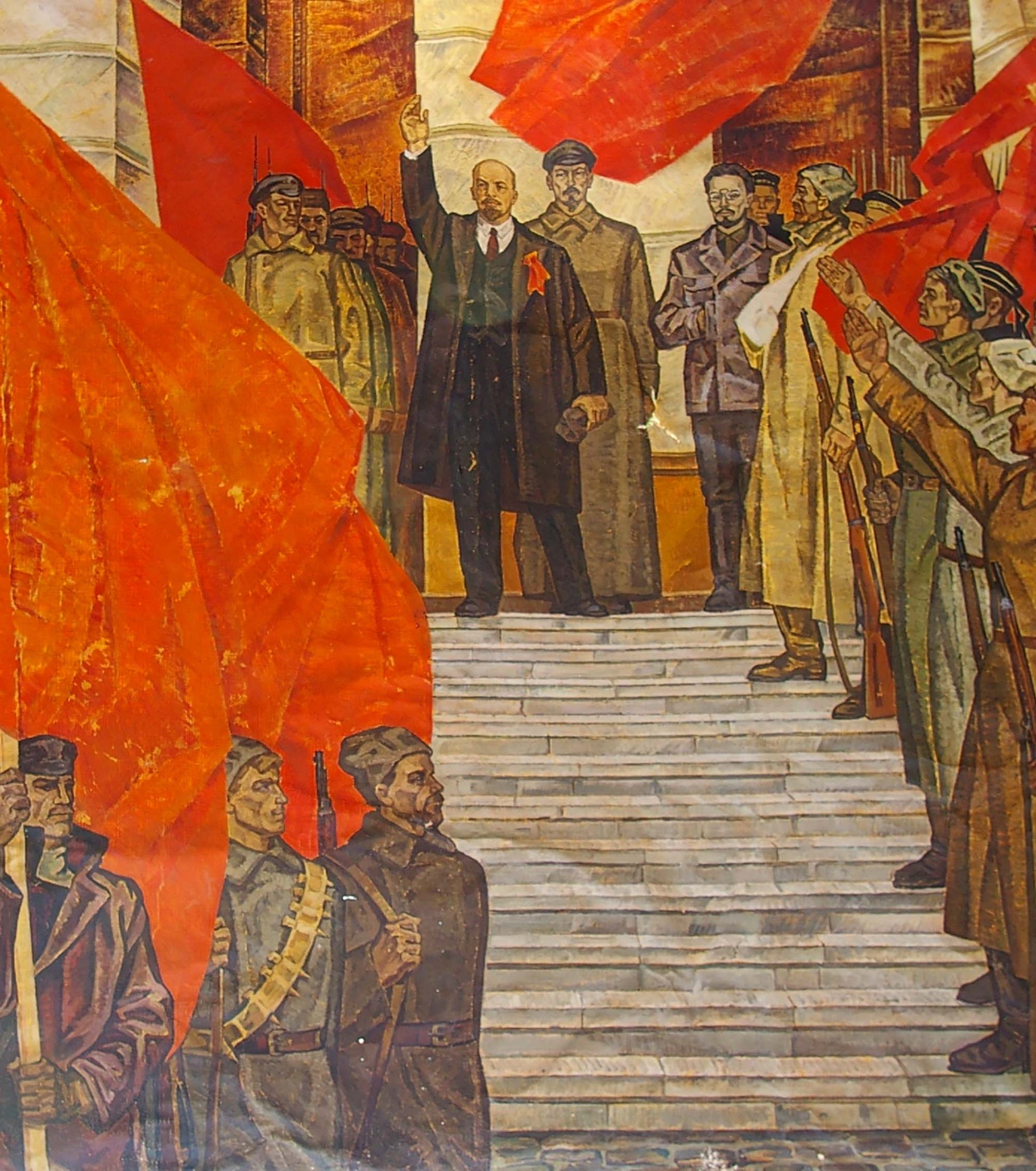 Oil painting October by Lyubavin Yuri Mikhailovich: vibrant red flag billowing in mural
