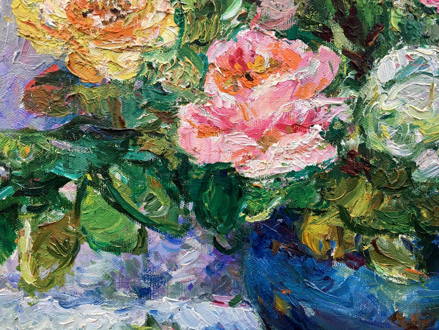 Oil painting of vibrant pink yellow roses in blue vase by Tamara Aleksandrovna Khitrova