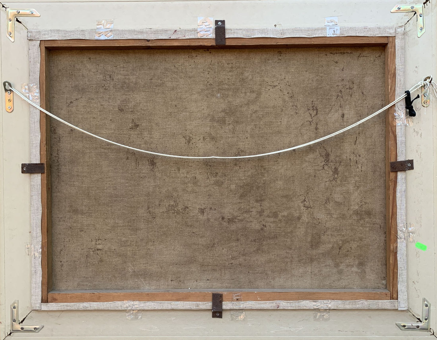 Back of Oil painting Between the Trees V. Shcherban brown canvas wooden frame white string