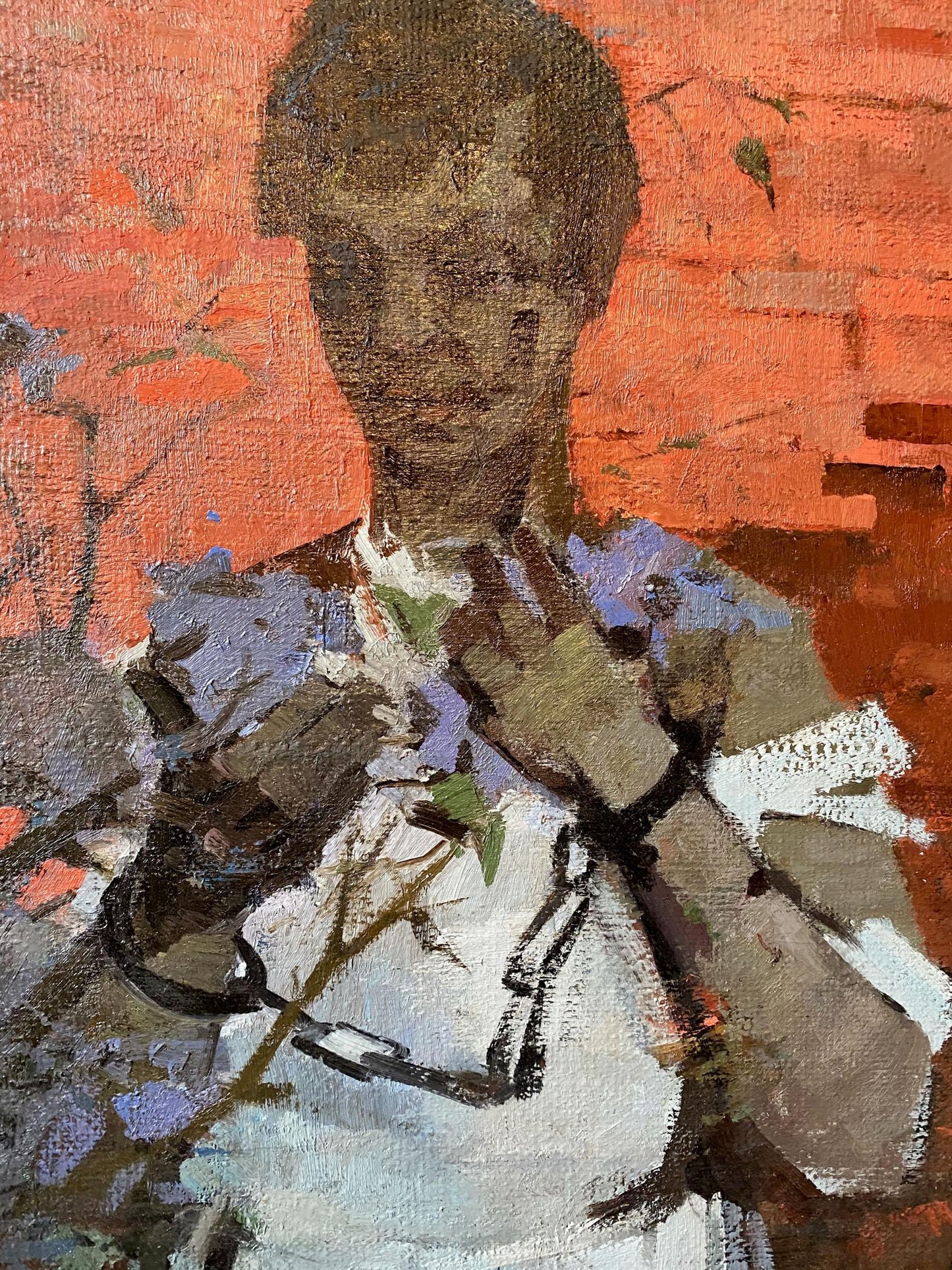 Textured oil painting Disobedient by Serbutovsky Andrey Andreevich: figure in white garment holding purple flowers against orange brick wall
