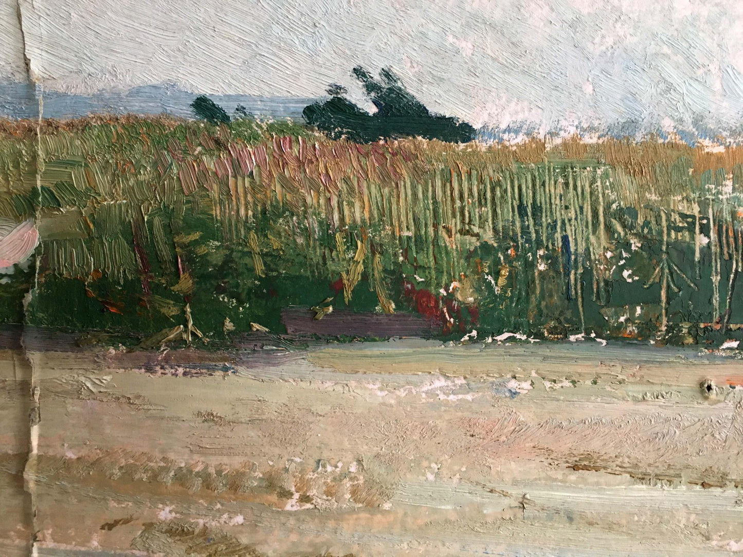 Oil painting of man walking across tall golden-green grass field under pale sky