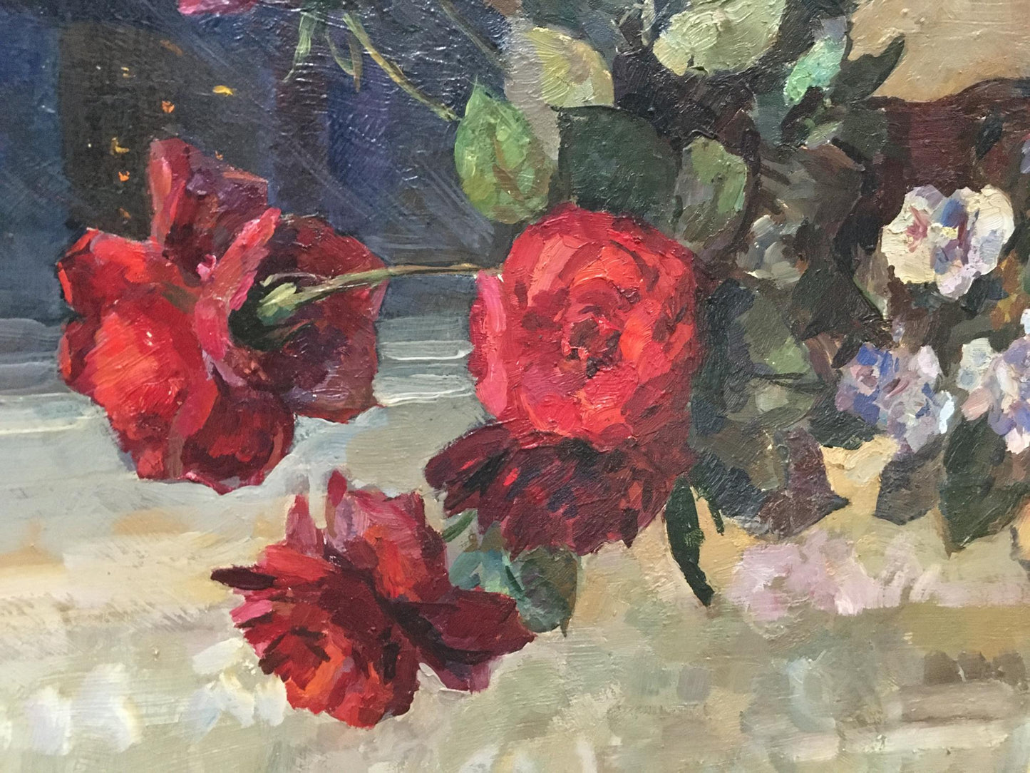 Oil painting of vibrant red roses by Natalya Alexandrovna Savitskaya