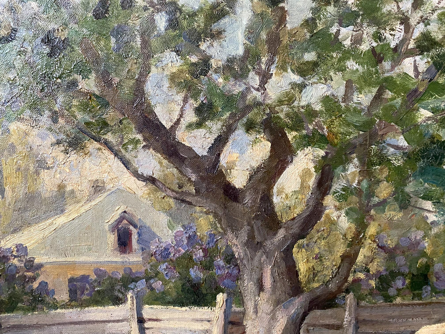 Oil painting of leafy tree and rustic house by Vladimir Ivanovich Kozlovsky