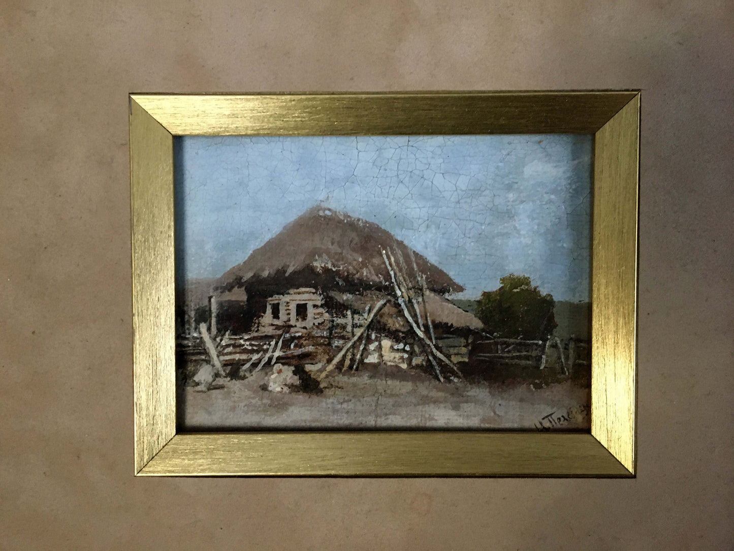 Oil painting of rustic thatched hut by Ivan Andreevich Pelevin