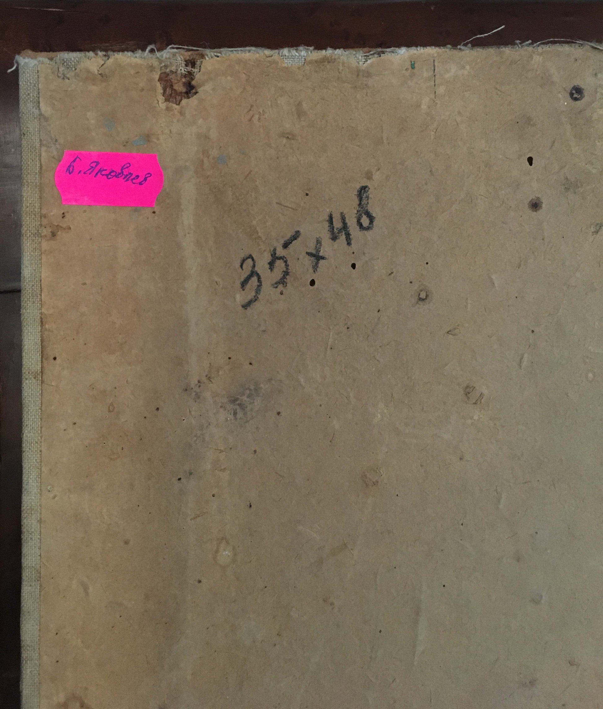 Worn beige cardboard book cover for Oil painting Flowers Yakovlev B. N. with pink sticky note and handwritten measurements
