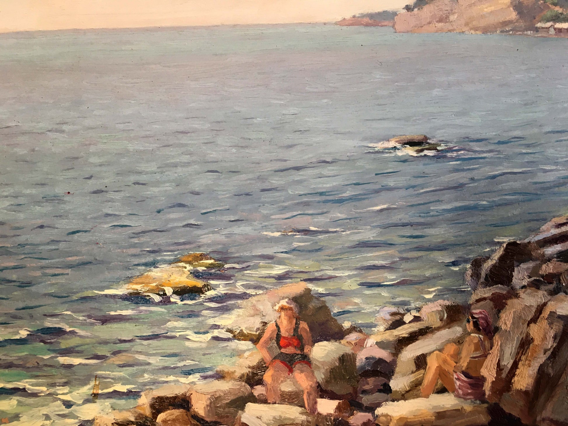 Serene oil painting of first sun rays on sea with figures on rocks
