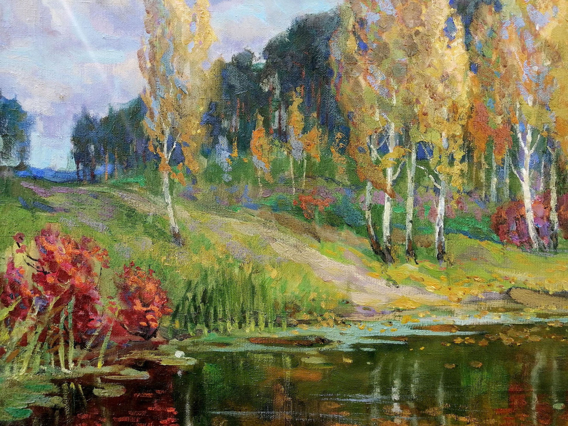 Oil painting by Zhabinsky Leonid Andreevich: autumn birch trees, red bushes, pond, hills