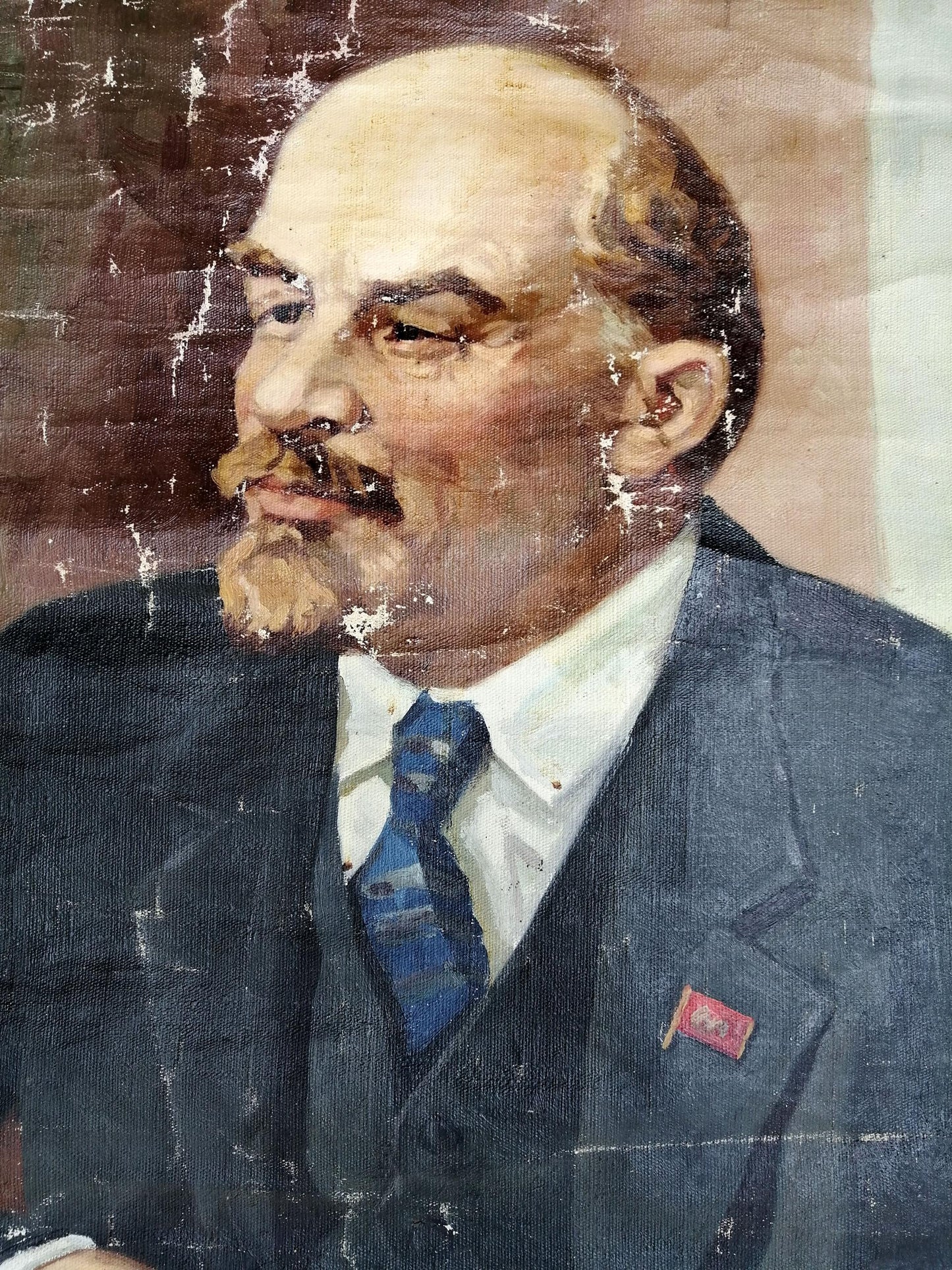 Weathered social realism oil portrait of Vladimir Lenin in dark suit