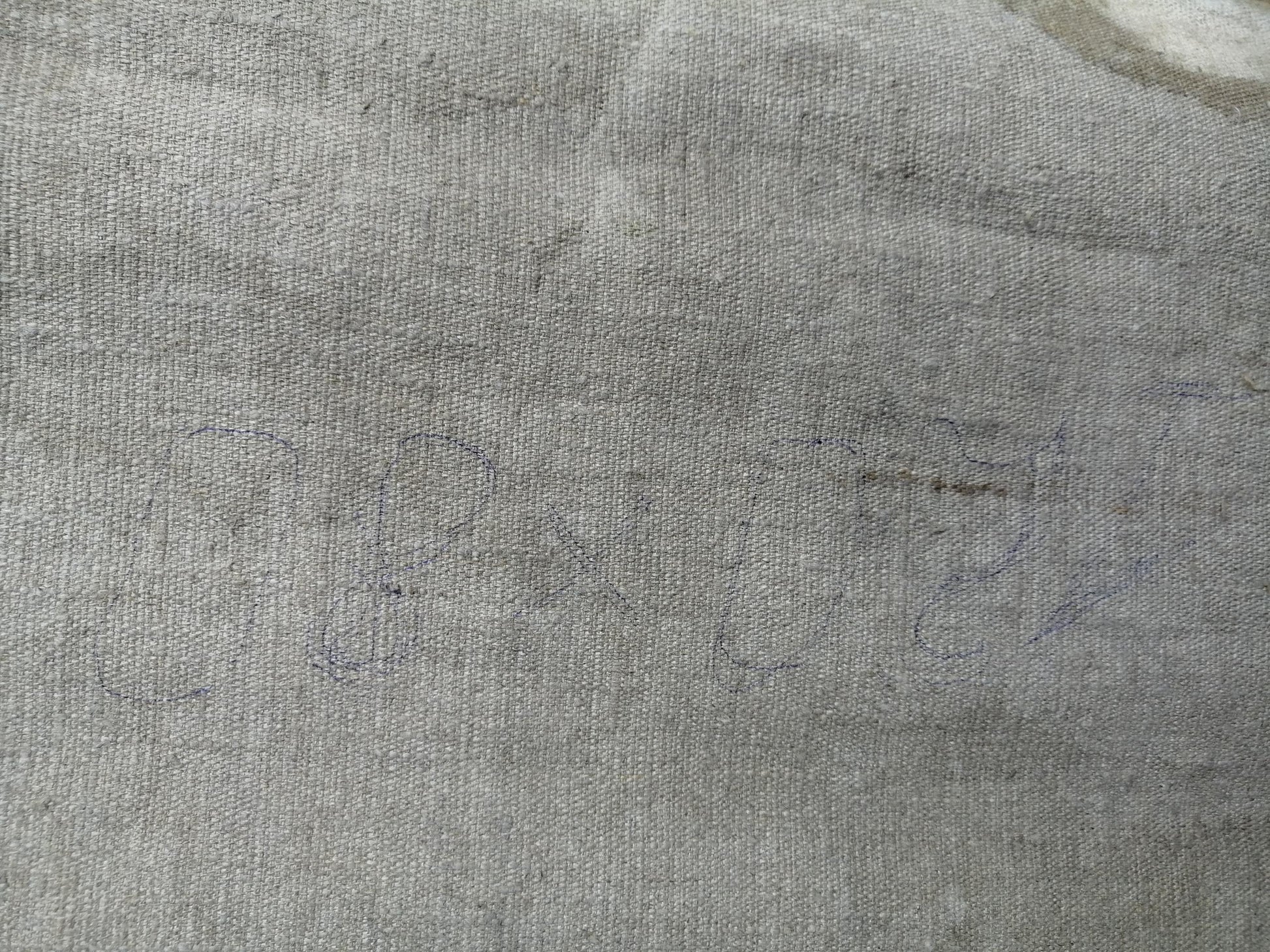 Back of social realism oil portrait of Lenin on gray textured fabric