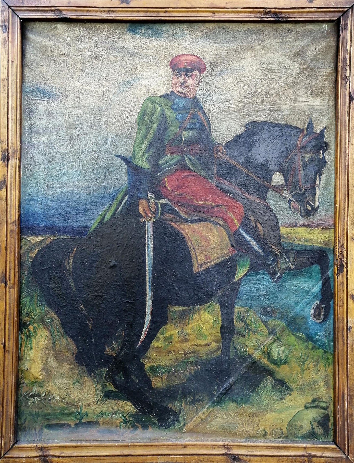 Social realism oil painting of Kotovsky on horseback in rustic frame
