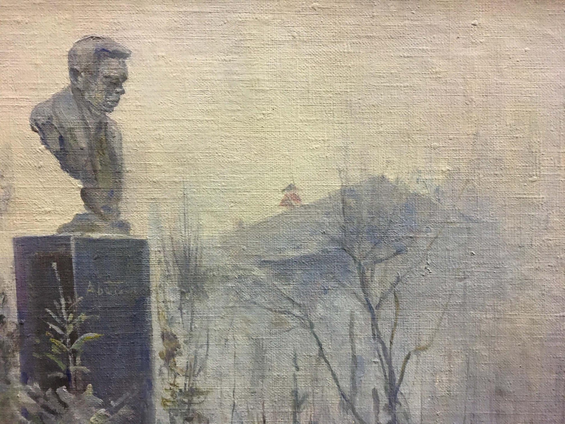 Dark gray stone bust of man on black pedestal, Konovalyuk Fedor Zotikovich monument