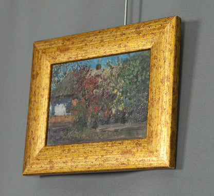 Rustic gold frame with Tsyupkas oil painting of garden and old house