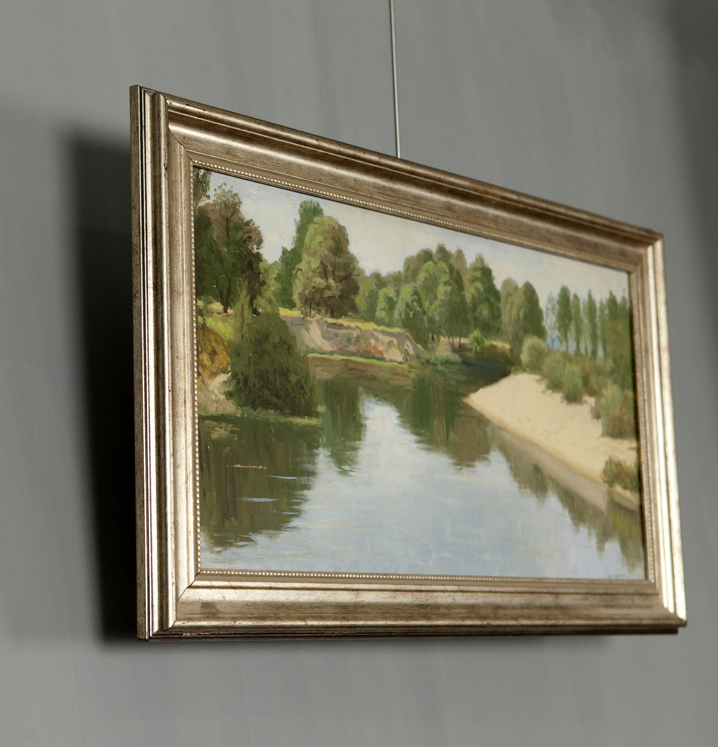 Summer River Oil Painting: serene river scene with lush trees in gold frame