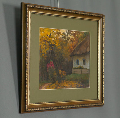 Oil painting Autumn and comfort: rustic cottage amid autumn trees in ornate frame