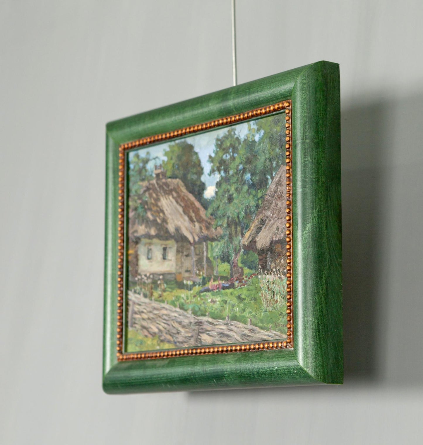 Original green wooden-framed painting by Soviet artist Zyupka I of rustic village scene