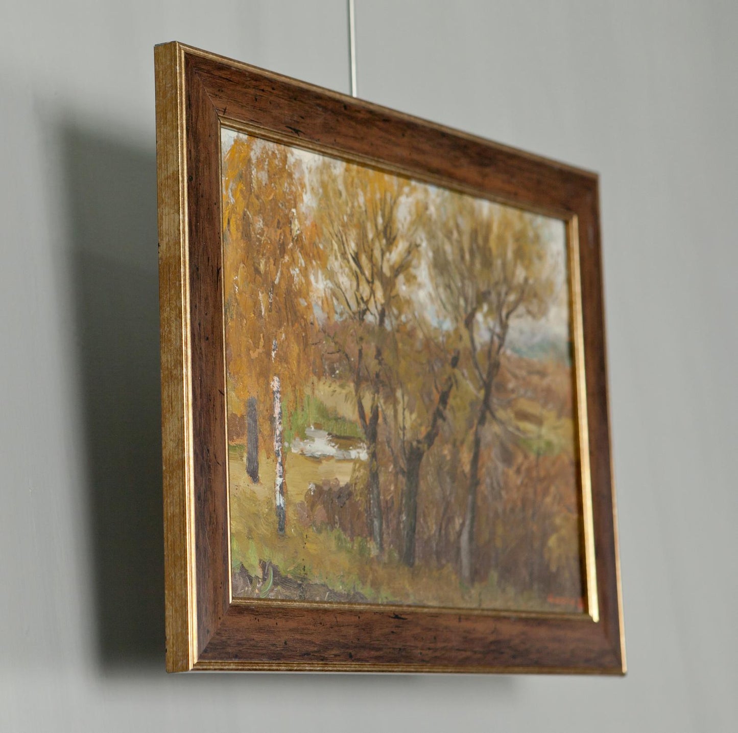 Framed autumn landscape oil painting by Ivan Tsyupka in gold-trimmed wood frame