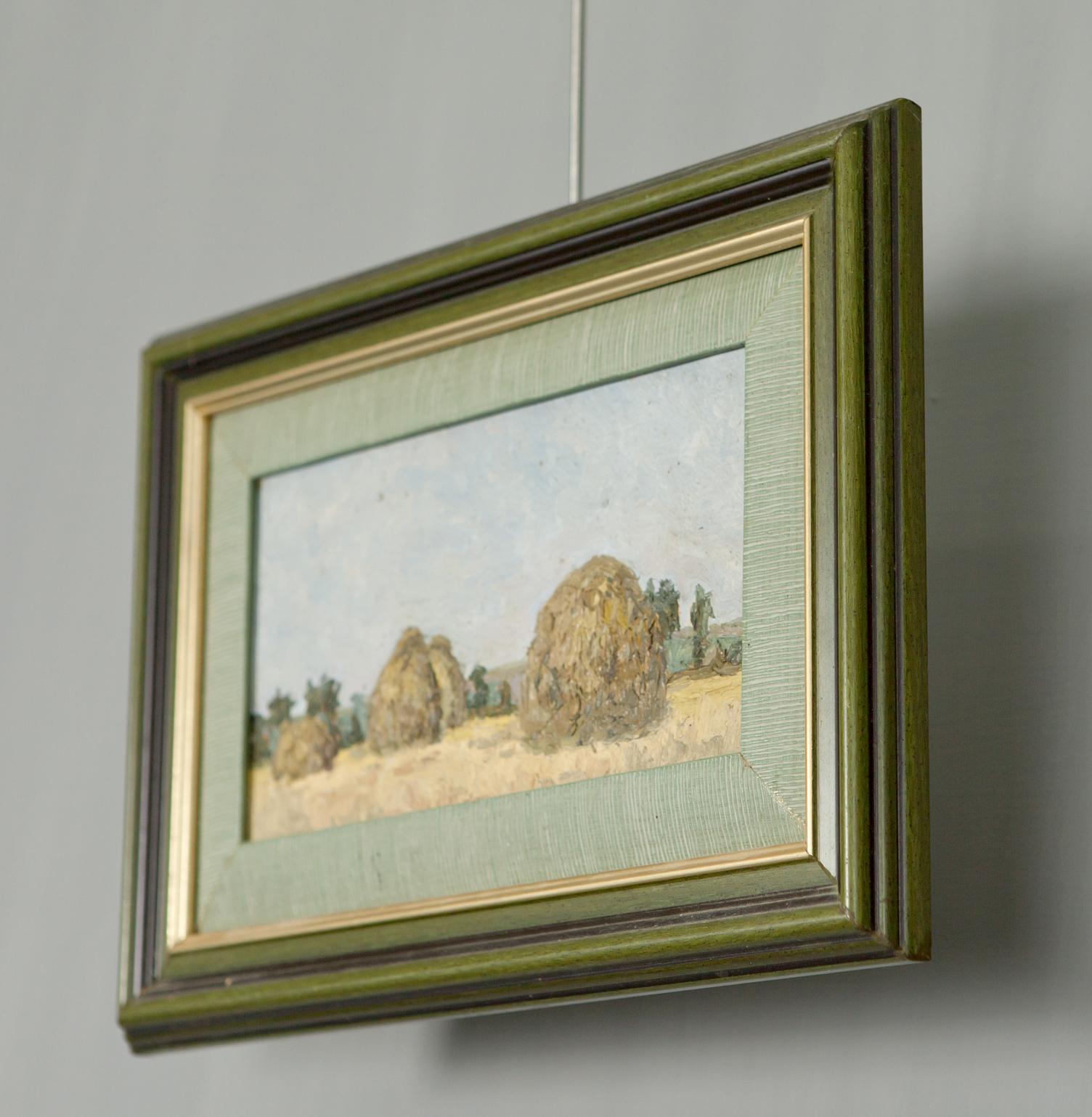 Antique Landscape in Oil: framed miniature of golden haystacks in olive-gold frame