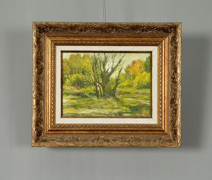 Oil painting in the forest: ornate gold-framed autumn landscape