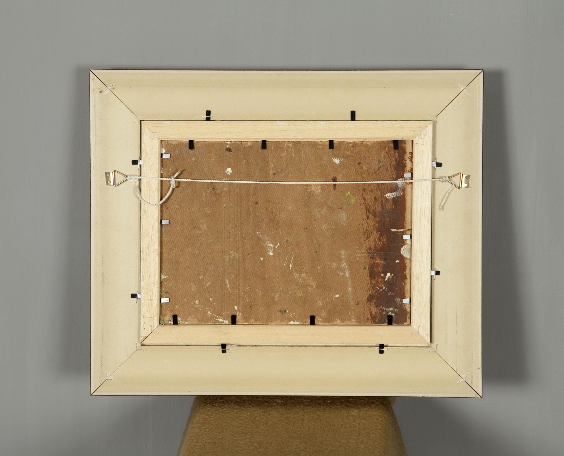 Back of beige distressed rectangular frame for Oil Painting In the Forest
