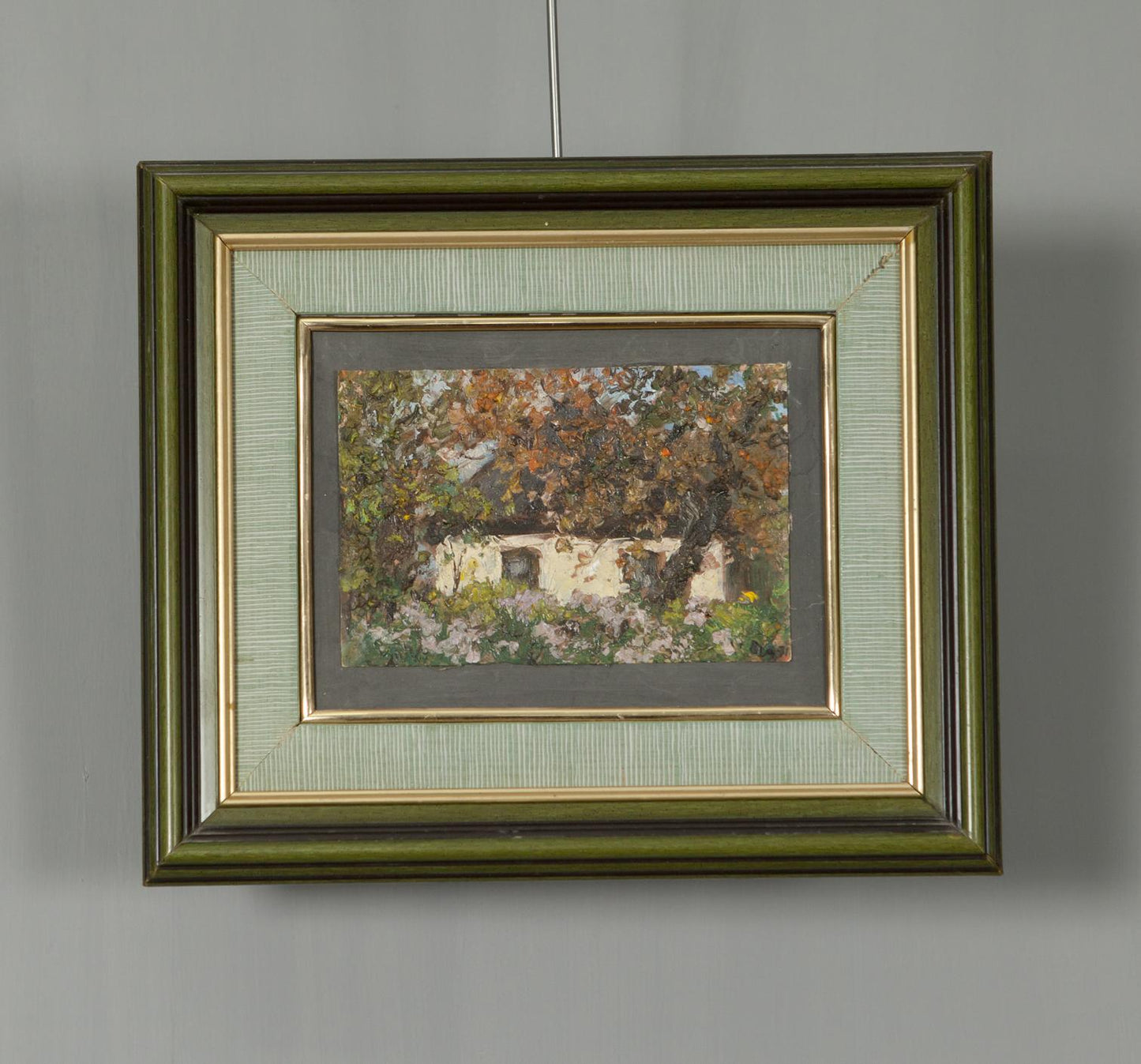 Oil painting by Ivan Tsyupka: evening over rustic white cottage in autumn foliage, green gold frame