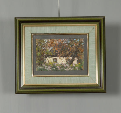 Oil painting by Ivan Tsyupka: evening over rustic white cottage in autumn foliage, green gold frame