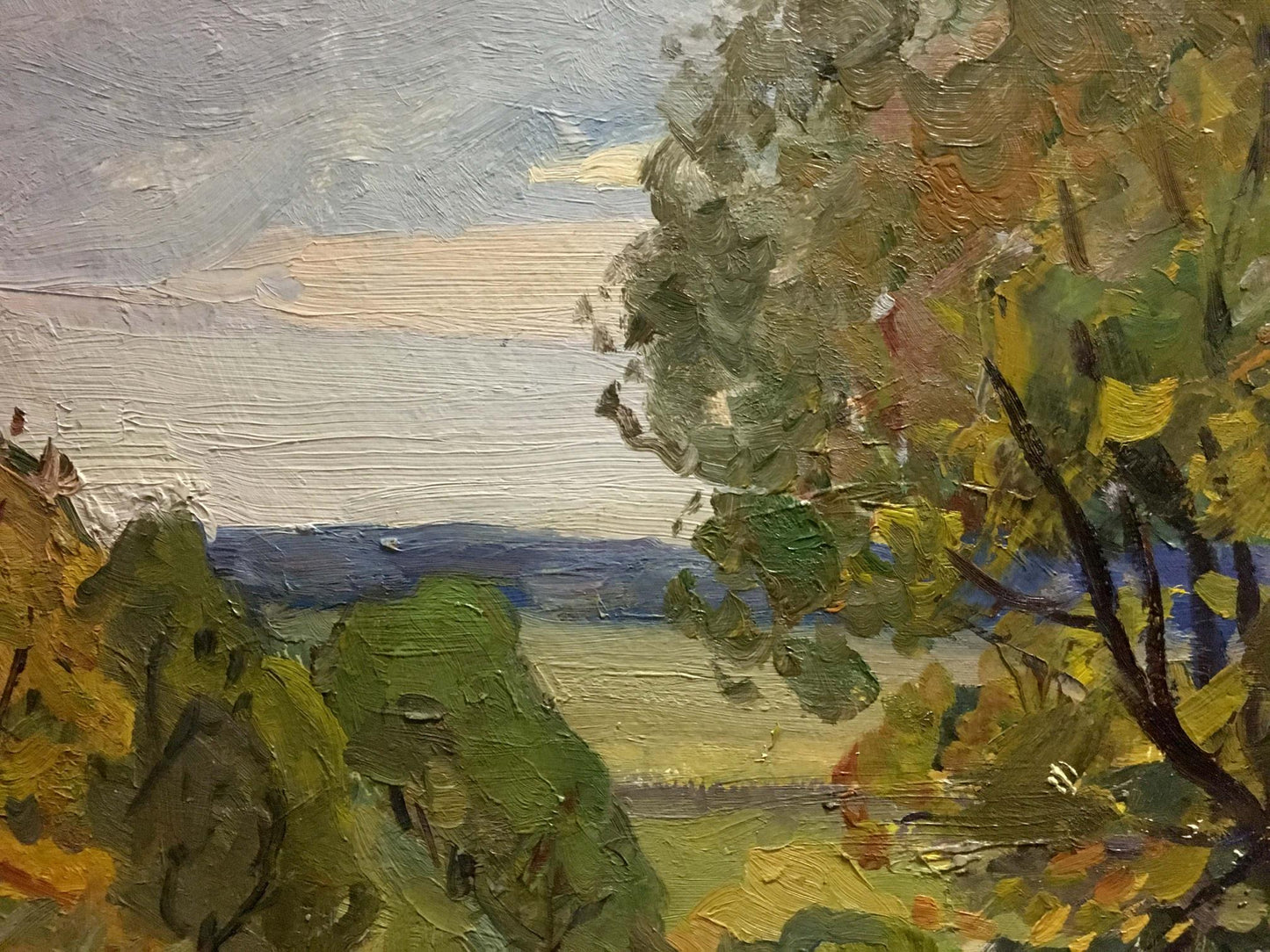Impressionistic oil painting of old big tree with textured green foliage and soft sky