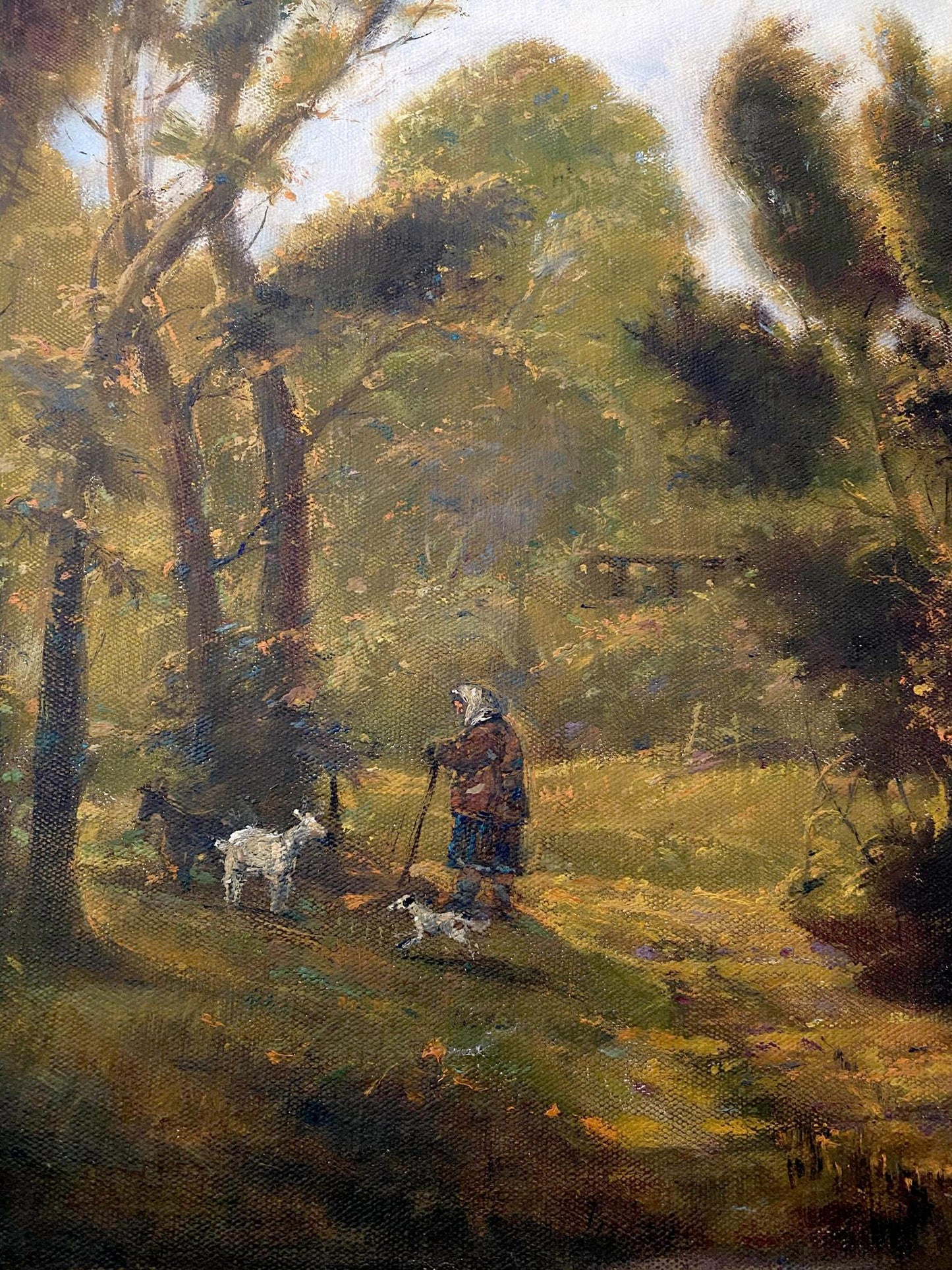 Rustic oil painting September day by Oleg Litvinov: woman with goats in sun-dappled forest