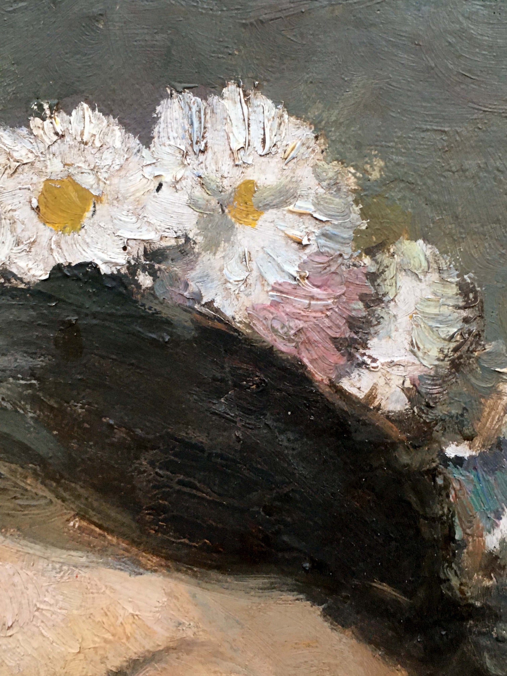 White daisies with yellow centers in thick impasto oil portrait of Ukrainka