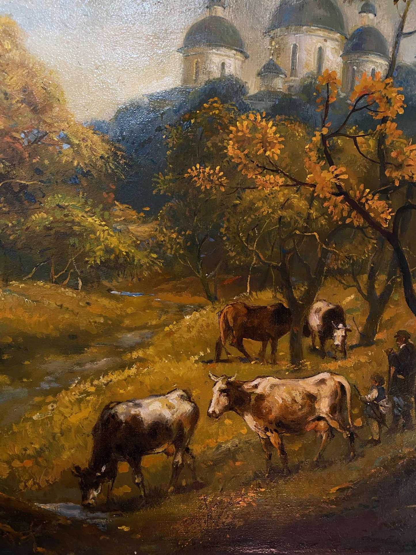 Serene oil painting by Litvinov Oleg Arkad’yevich: cows graze under autumn trees by domed churches