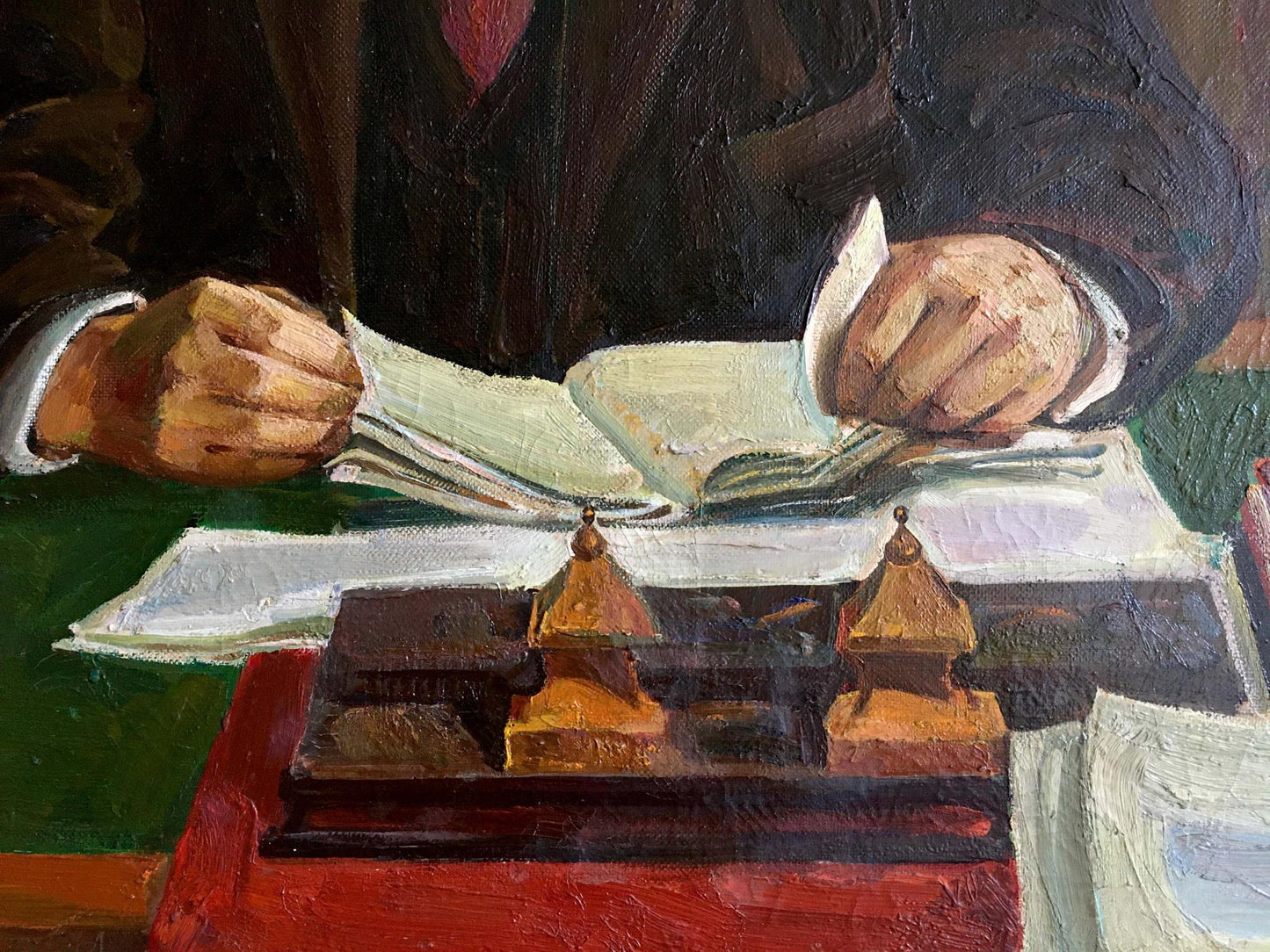 Dark wooden inkwell with golden pagoda lids on red surface in Lenin oil painting