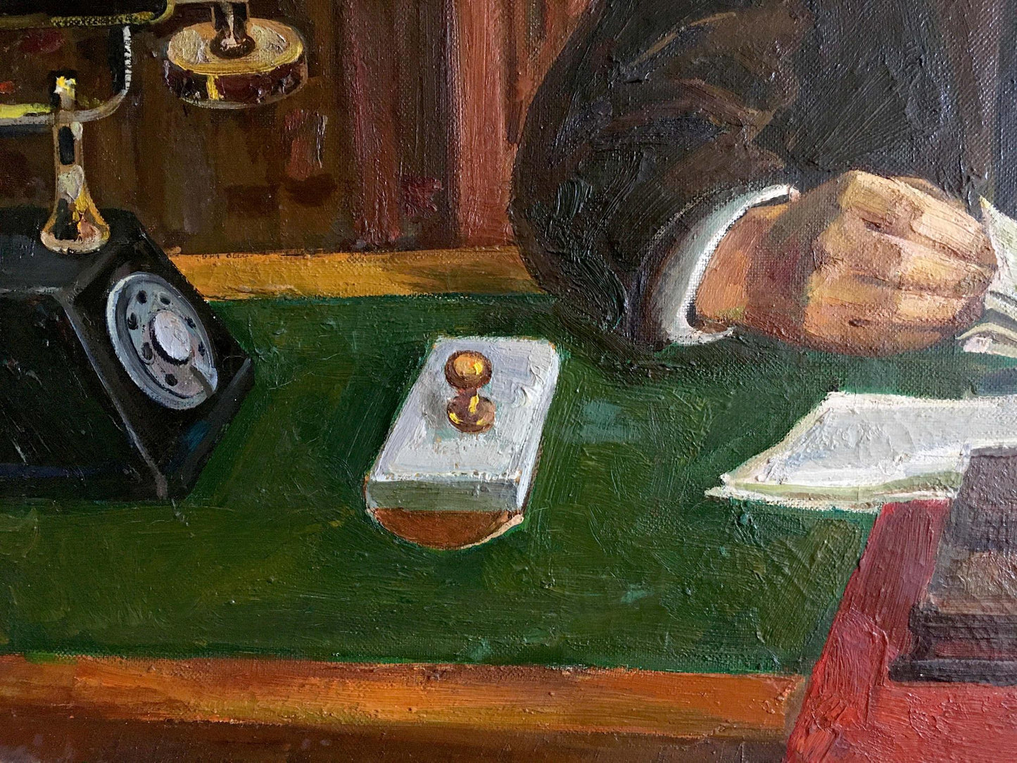 White rectangular stamp with golden knob on Oil painting Lenin at the table